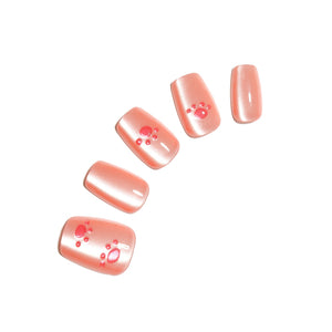 Pawfectly Peachy medium square peach paw print press-on nails 30-piece set