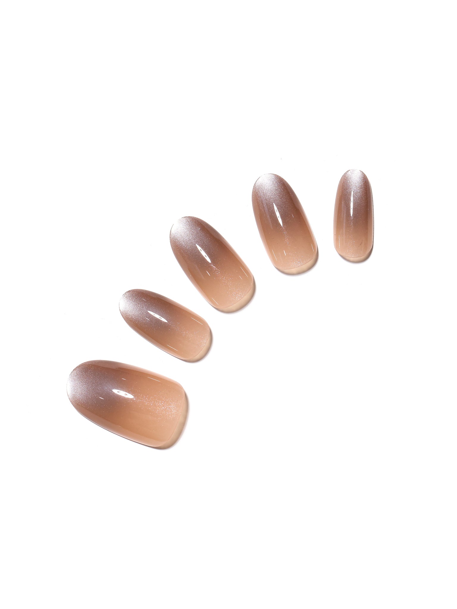 Brown oval ombre cat eye press-on nails with magnetic shimmer on white background