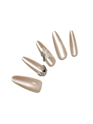 Soft Bloom long stiletto nude chrome press-on nails champagne pearl glow butterfly accent 30-piece set