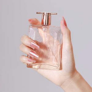Hand wearing Pink Blush long coffin rose pink chrome press-on nails