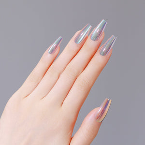 Hand showing holographic metallic coffin press-on nails that reflect rainbow colors
