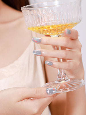 Blue koi fish nail art press on nails with pond inspired design on square acrylic tips