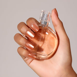 Close-up Citrus Squeeze copper orange metallic pearl press-on nails square glossy glow finish
