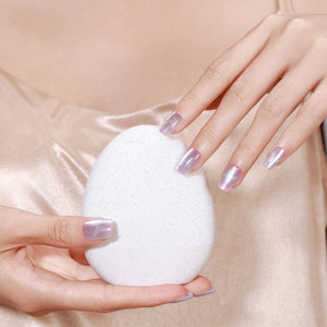 Hand wearing Frosted Butterfly pastel butterfly French press on nails with soft glitter finish