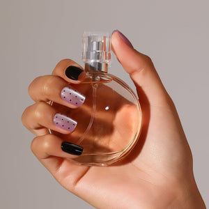 Close-up Dot Me Darling lavender micro dot press-on nails with black accent manicure high gloss