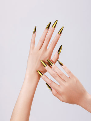 Hand wearing Sunlit Matcha long stiletto gold green chrome press-on nails glossy metallic finish