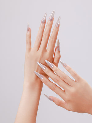 Close-up Peachy Promise sheer peach nude press-on nails glossy glaze shimmer