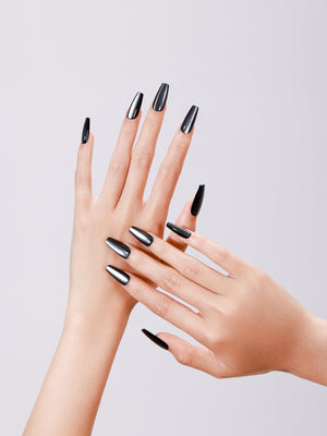 Both hands showing Dark Platinum long coffin black metallic press-on nails