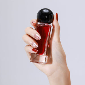 Romantic red floral press on nails in a medium square shape styled for everyday wear