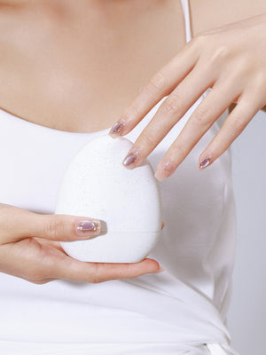 Closeup of Purple Quartz high-density acrylic short square press-on nails with luminous sheen