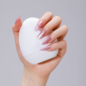 Close-up of Pink Cloud long oval pink acrylic press-on nails with salon-grade gel shine