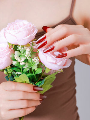 Deep red long oval press on nails with velvet-inspired glossy finish