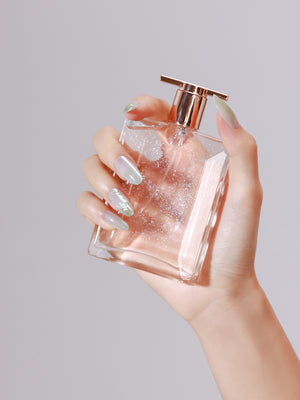 Close-up Spring Garden pearly mint chrome press-on nails botanical flower nail art details