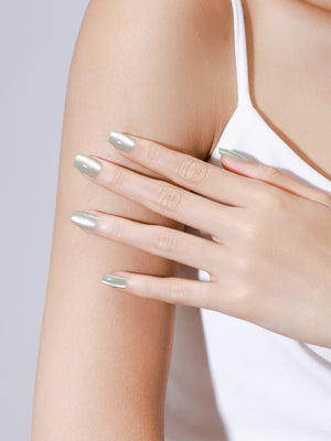 Hand wearing Matcha Latte matcha green square press on nails salon quality acrylic tips