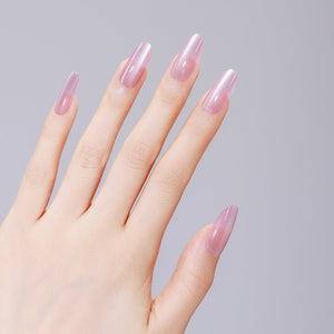 Close-up of Pink Cloud long oval pink acrylic press-on nails with salon-grade gel shine