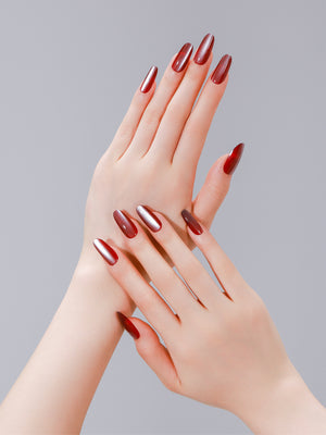 Hand wearing Red Velvet deep red long oval press on nails for everyday manicure