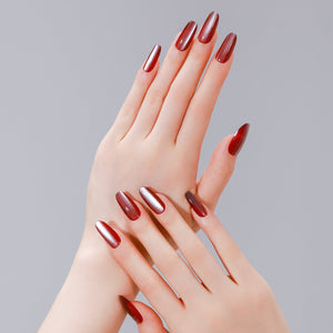 Hand wearing Red Velvet deep red long oval press on nails for everyday manicure