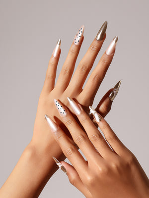 Soft nude long stiletto press on nails with glossy salon-style finish
