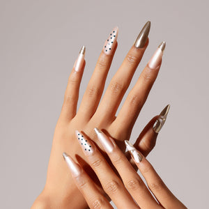 Soft nude long stiletto press on nails with glossy salon-style finish