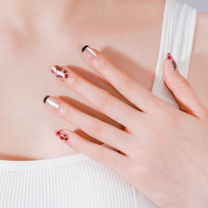 Short–medium square leopard French press-on nails in Shadowed Rose design on nude base