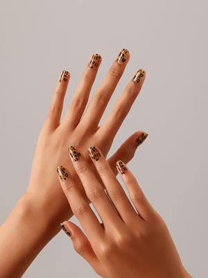Full set showing Sparkle Safari short square animal print press-on nails leopard pattern on all nails