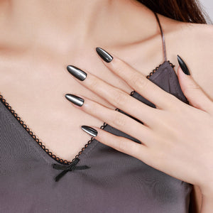 Both hands showing Noir Eclipse long almond black chrome acrylic press-on nails night-out manicure