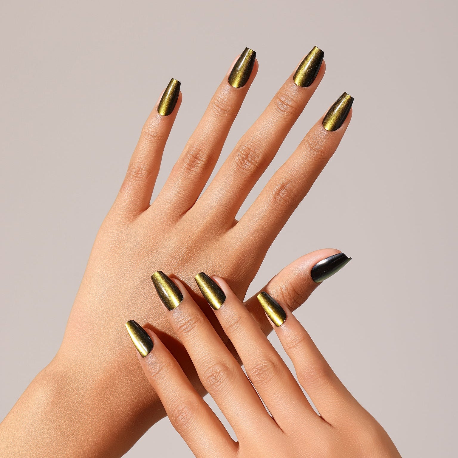 Flat lay Olive Pop long coffin press-on nails olive green gold magnetic cat eye design set