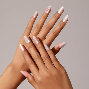 Close-up Cotton Candy aurora shimmer press-on nails soft baby pink pearl glow salon look