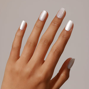 Full set showing Silver Moon short square silver chrome press-on nails glossy pearly white shine