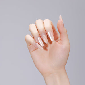 Long oval soft peach press-on nails with glossy gel finish