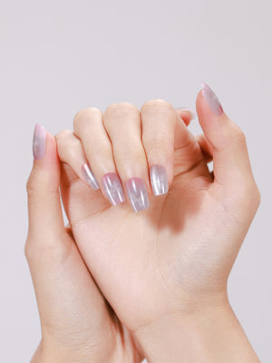 Close up of Frosted Butterfly multicolor butterfly French glitter press on nails on neutral background