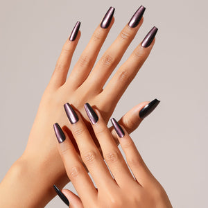 Hand wearing Eggplant dark purple long coffin press on nails with glossy finish