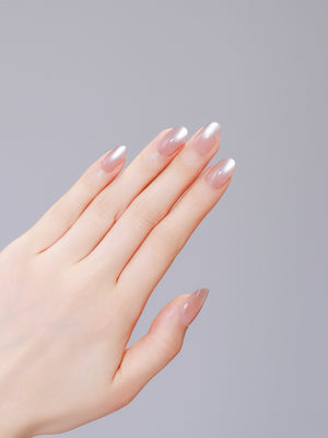 Close-up of Latte Dust PMMA acrylic oval latte pink press-on nails