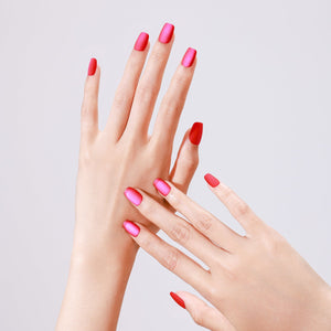 Close-up of Popstar Pink PMMA acrylic short square hot pink press-on nails