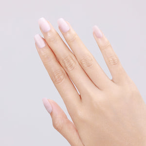 Close-up of Snow Silk short square PMMA acrylic white press-on nails with gel shine