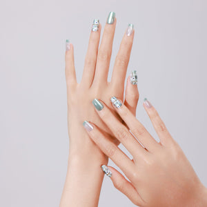 Close-up of Meadow Bloom PMMA acrylic short square mint plaid daisy press-on nails with gold detail
