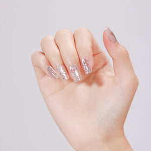 Close-up of Blushing Belle nude pink press-on nails in wearable length