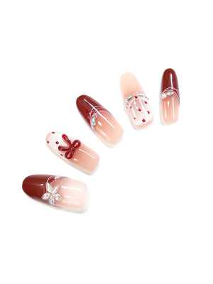 Cherry Ribbon handmade long oval press on nails with cherry red French tips and nude ombré base