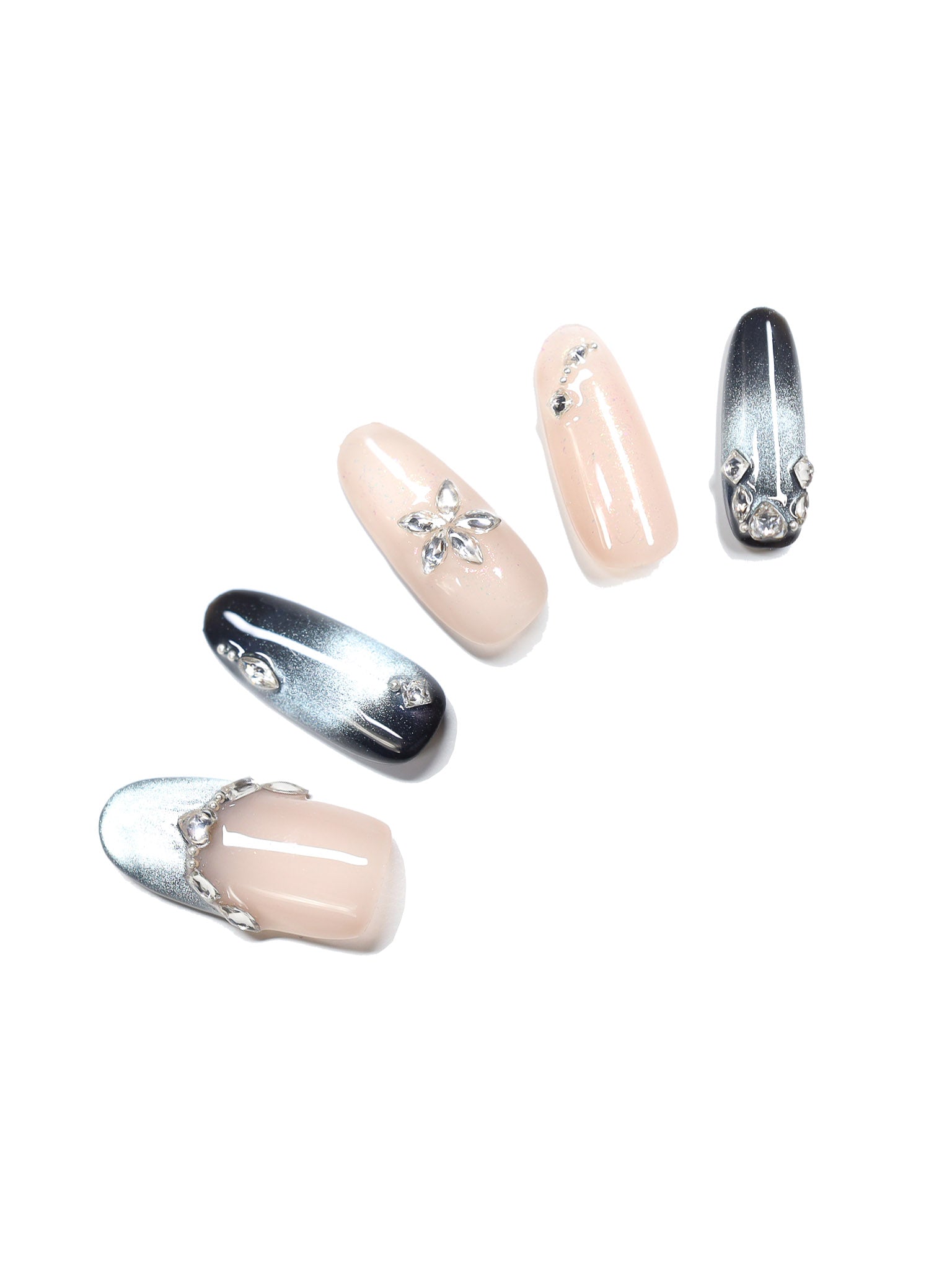 Handmade oval nude press-on nails with silver chrome ombre and rhinestone accents