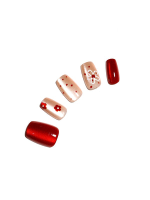 Ruby Blossom red floral square press on nails on nude base with cherry red accents