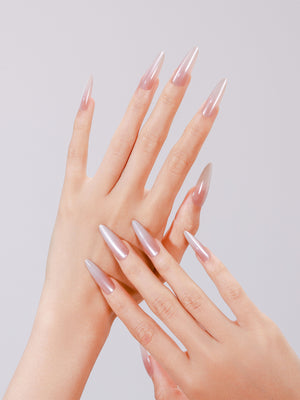 Both hands showing Light Peachy long stiletto glazed nude acrylic press-on nails luminous manicure