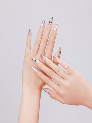 Hand wearing Palm Coast long almond metallic press-on nails with palm tree accent nail art