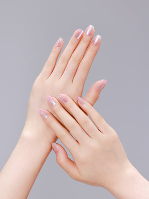 Hand wearing Peach Slush multicolor peach square press-on nails with glossy gel finish
