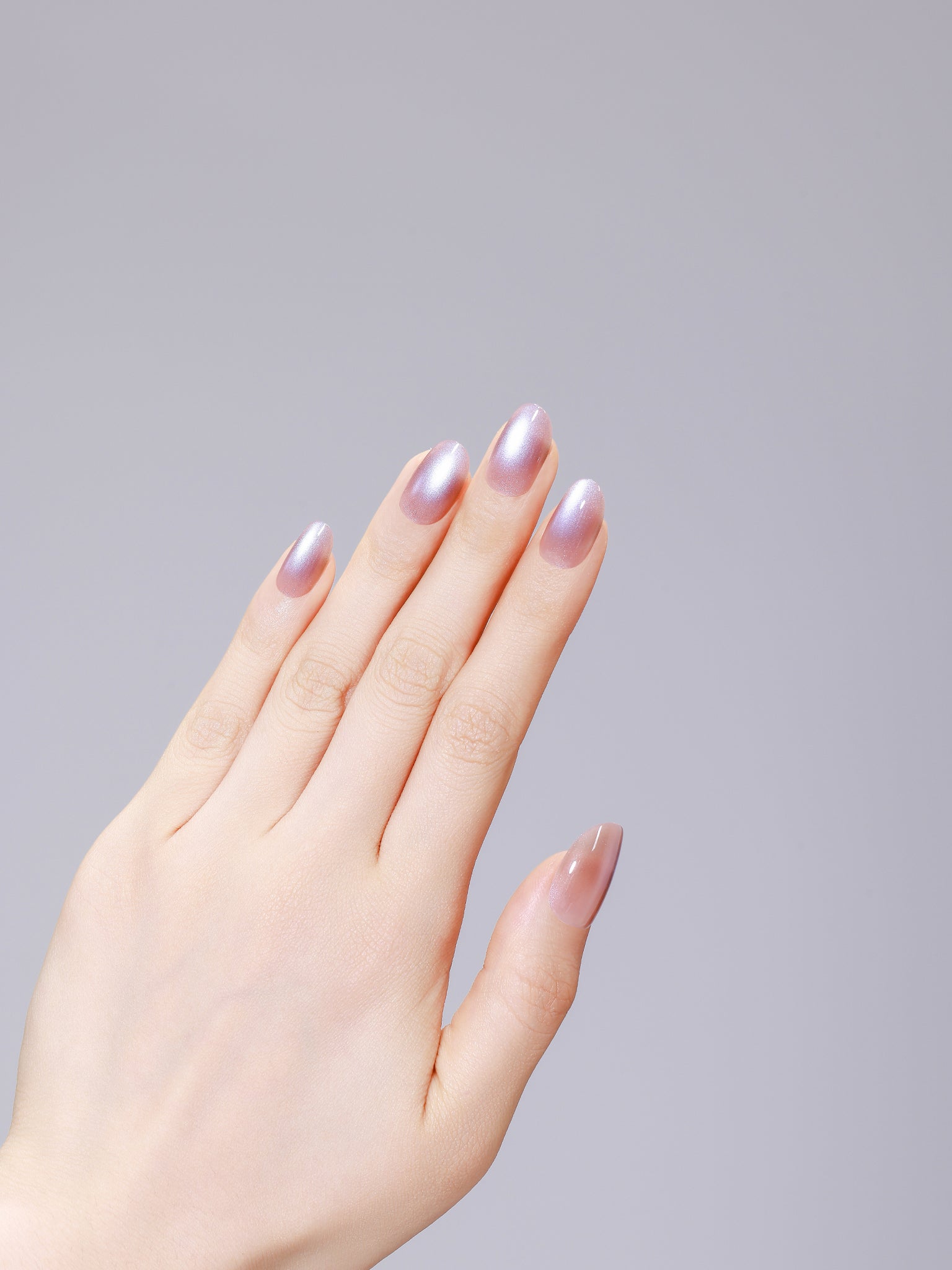 Long oval lavender nude press-on nails with glossy gel finish