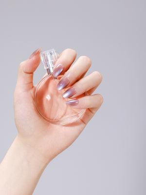 Purple oval ombre cat eye press-on nails with dimensional cat eye shine