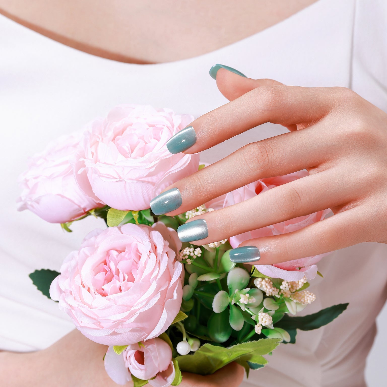 Hand wearing Crystal Wave acrylic press-on nails with glossy crystal-inspired shine
