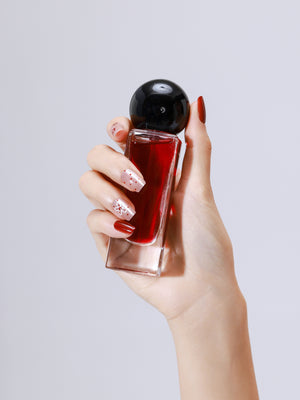 Romantic red floral press on nails in a medium square shape styled for everyday wear