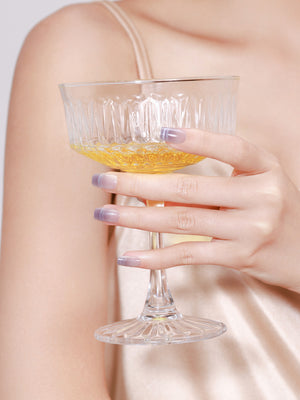 Complete 30-piece reusable press-on nail kit box with glue, file, and cuticle stick