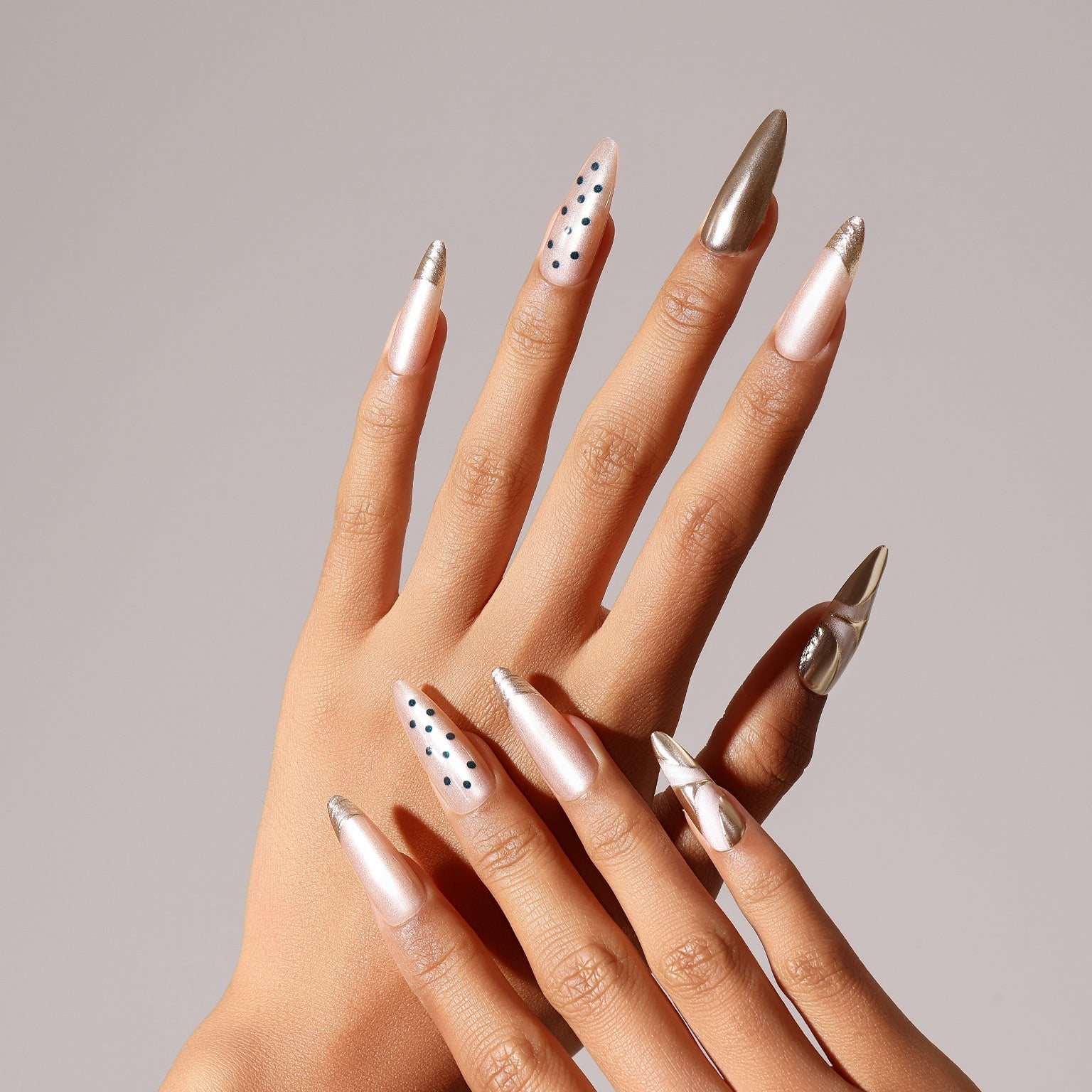 Soft nude long stiletto press on nails with glossy salon-style finish