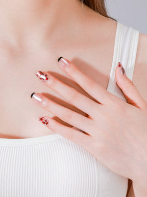 Short–medium square leopard French press-on nails in Shadowed Rose design on nude base